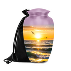 Golden sunset ocean waves cremation urn with seagulls and velvet bag
