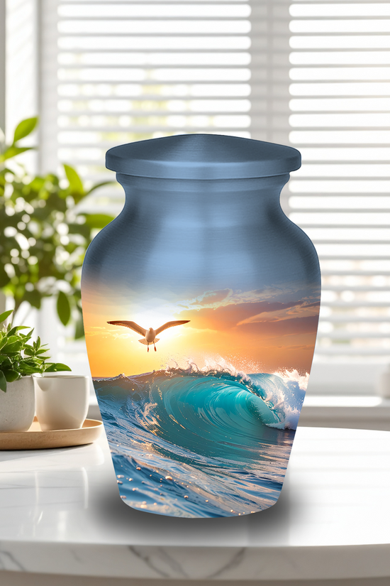 Premium aluminum cremation urn featuring sunset ocean design