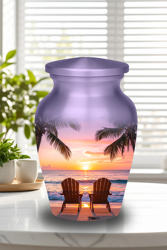 Adult and keepsake-sized tropical beach sunset memorial urns side-by-side, both crafted from aluminum