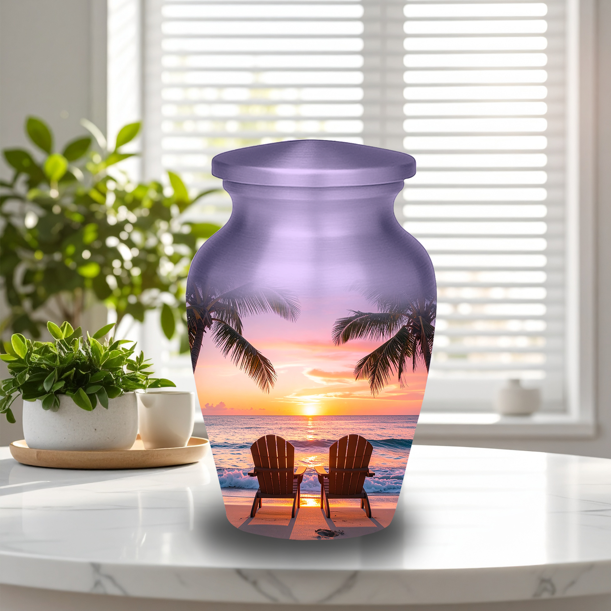 Adult and keepsake-sized tropical beach sunset memorial urns side-by-side, both crafted from aluminum