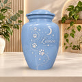 blue paw print star cremation urn for pet ashes, handmade aluminum memorial urn – photo 1